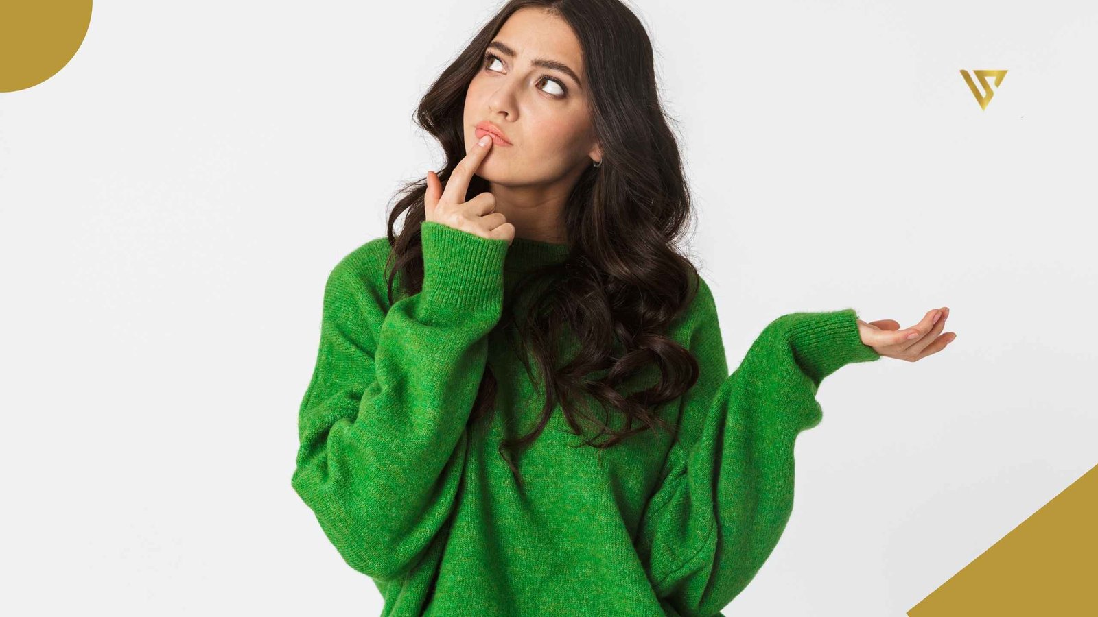 Young woman with dark hair looking diagonally upward. Her left hand is held with the palm facing upward, while the index finger of her right hand gently rests on her lower lip. What to Do (and Avoid) After Your First Facial. Beauty Spa by Val.